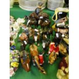 Beswick and other horse figures.