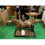 Spelter horse and jockey vesta & a carved bone boat.