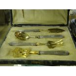 Cased French silver gilt servers