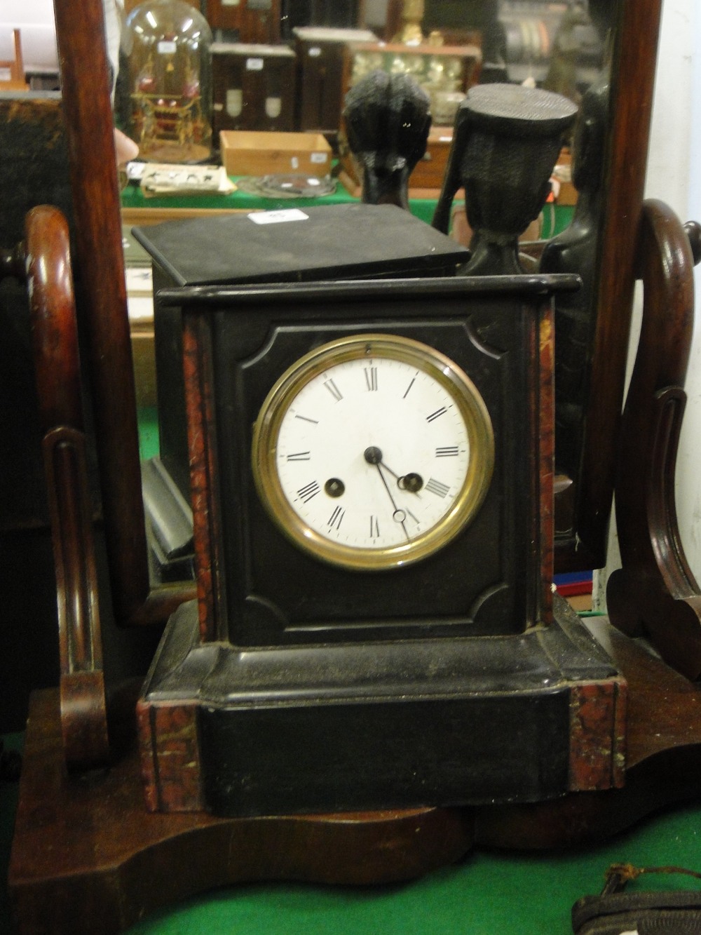 2-train slate mantel clock and a swing toilet mirror.