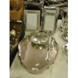 4 silver plated photo frames, a candelabra, serving tray, etc.