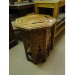 An octagonal Moorish design occasional table with inlaid decoration.