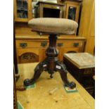 A Victorian mahogany revolving piano stool.