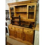 A modern polished pine 2-section kitchen dresser.