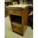 A French carved oak marble top pot cupboard.