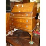 A Queen Anne style walnut 3 drawer bureau.