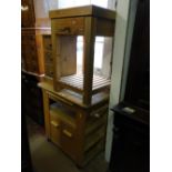 A pine butcher's block and a pine kitchen cabinet.