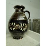 19th century slip glaze earthenware jug.