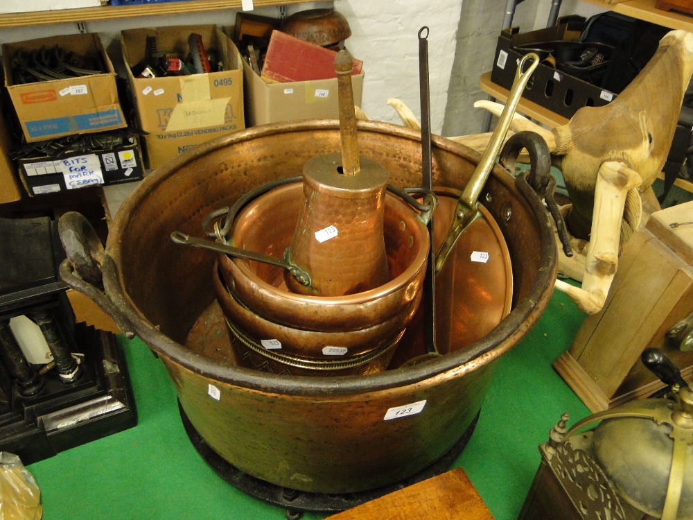 A Copper with iron swing handle on stand, cream skimmer,