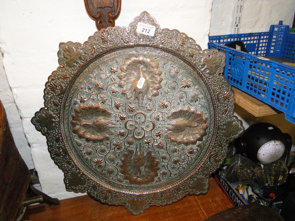 An Eastern copper plaque.
