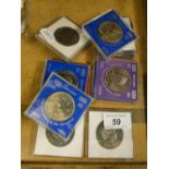 11 cased £5 Commemorative coins.