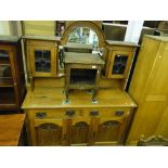 An Art Nouveau oak mirror back sideboard,