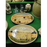 A pair of Iden Pottery plates, paperweights and a ginger jar.