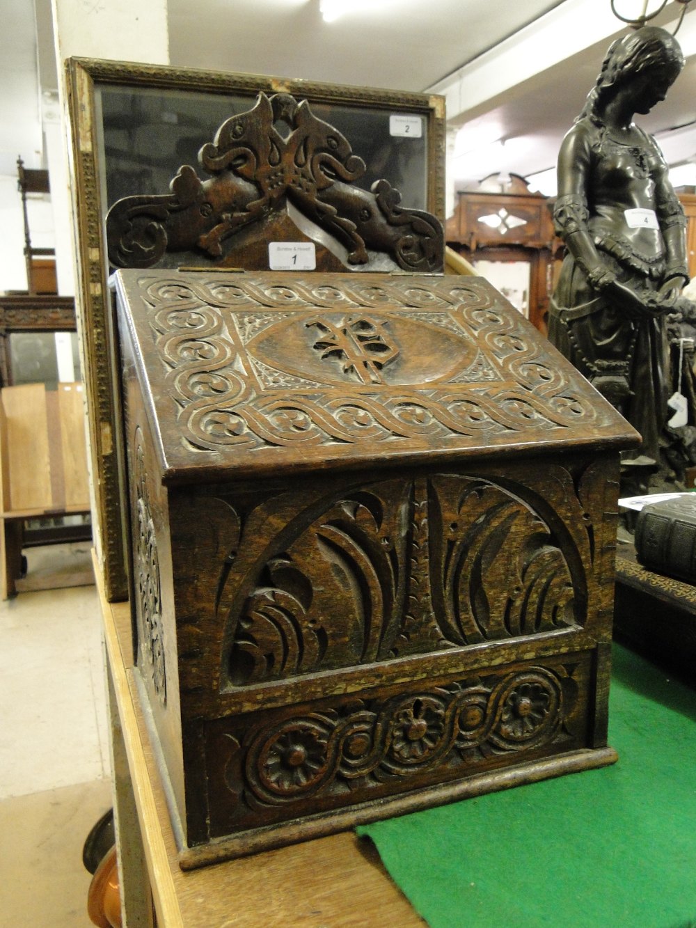 Antique carved oak candle box with drawer under.