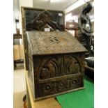 Antique carved oak candle box with drawer under.