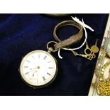 A Waltham engine turned silver key wind pocket watch