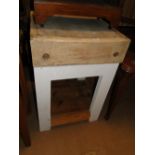 A Victorian pine square butcher's block on stand.