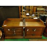 A pair of small 2 drawer table top chest.