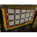 A large patchwork quilt, 151cm x 199cm.