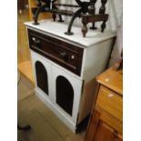 A Victorian painted and polished mahogany secretaire cabinet.