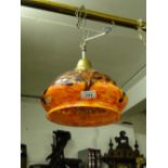 A mottled glass ceiling light with fitting
