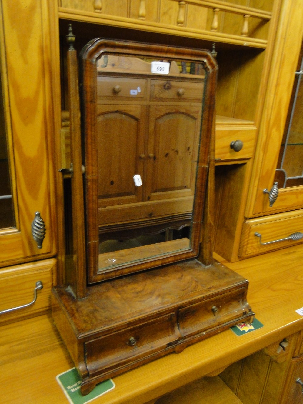 George III mahogany swing toilet mirror with 2 drawers to the base on bracket feet.