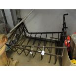 2 cast-iron hay racks.