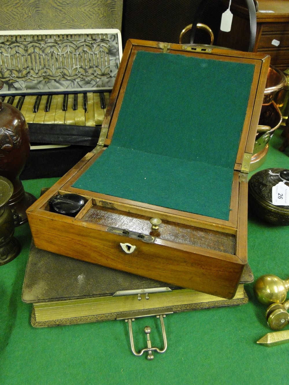 Leather bound Victorian photo album and a mahogany writing slope with fitted interior.