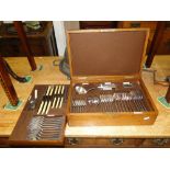 Oak cased canteen of Walker & Hall Old English pattern silver plated cutlery