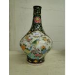 Chinese vase with bird and floral panels.