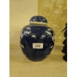 Chinese ginger jar and cover
with prunus decoration, height 8.5".