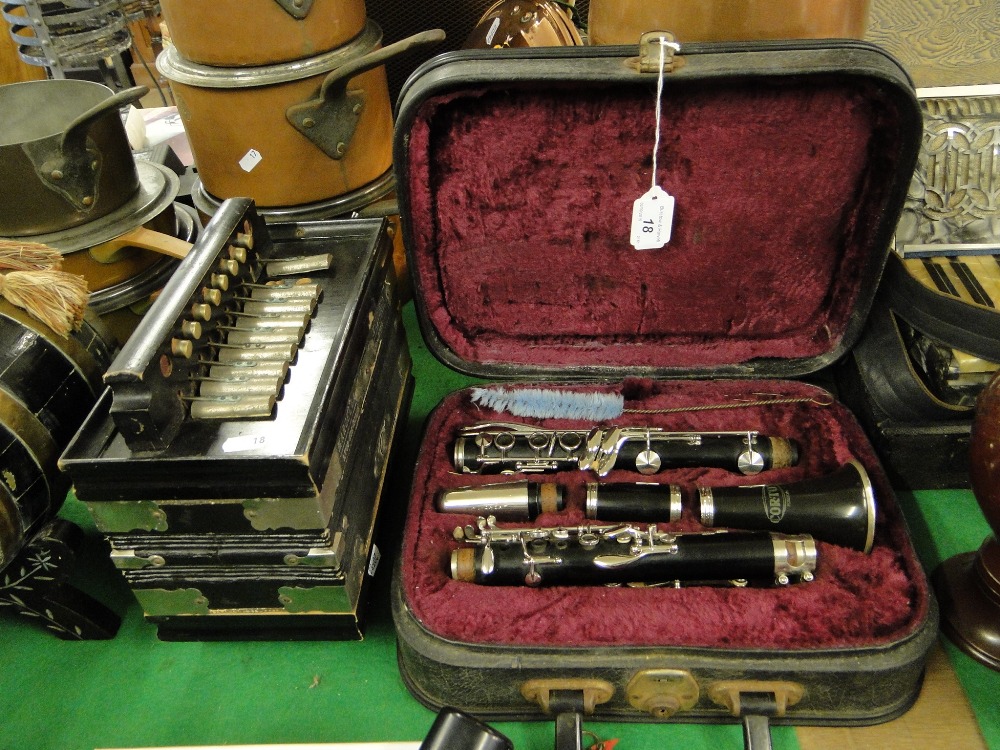 A cased Corton clarinet.