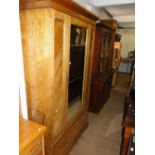 Edwardian ash single mirror door wardrobe with drawer to the base.