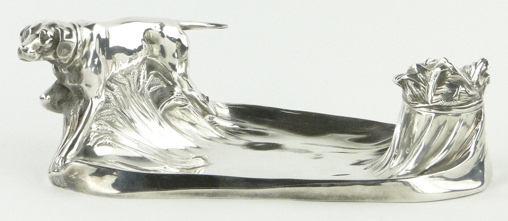 A Kayser Art Nouveau silver plate desk stand,
in the form of a gun dog in cornfields, length 28cm.