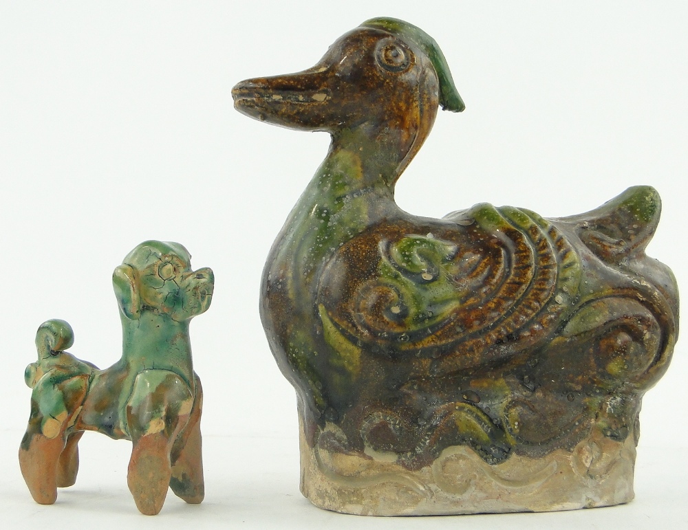 Chinese Sancai-glaze pottery duck, 
height 5.75" and a dog, (2).