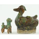 Chinese Sancai-glaze pottery duck, 
height 5.75" and a dog, (2).