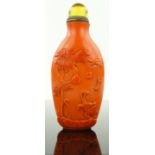 Chinese carved snuff bottle and stopper
with trees and cricket designs, height 3.75".