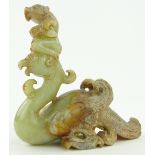 Chinese carved jade phoenix surmounted by a figure,
height 3.1".