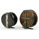 An early 20th century brass and wood fishing reel,
diameter 3.5" and a Bakelite reel, (2).