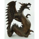 A Chinese carved wood dragon, 
height 20".