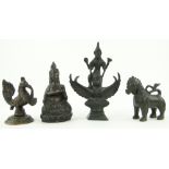 A bronze figure of Krishna on Garuda,
6.25" and 3 other Oriental bronze figures, (4).