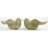 A pair of carved jade boxes 
modelled as Mandarin ducks, length 5".