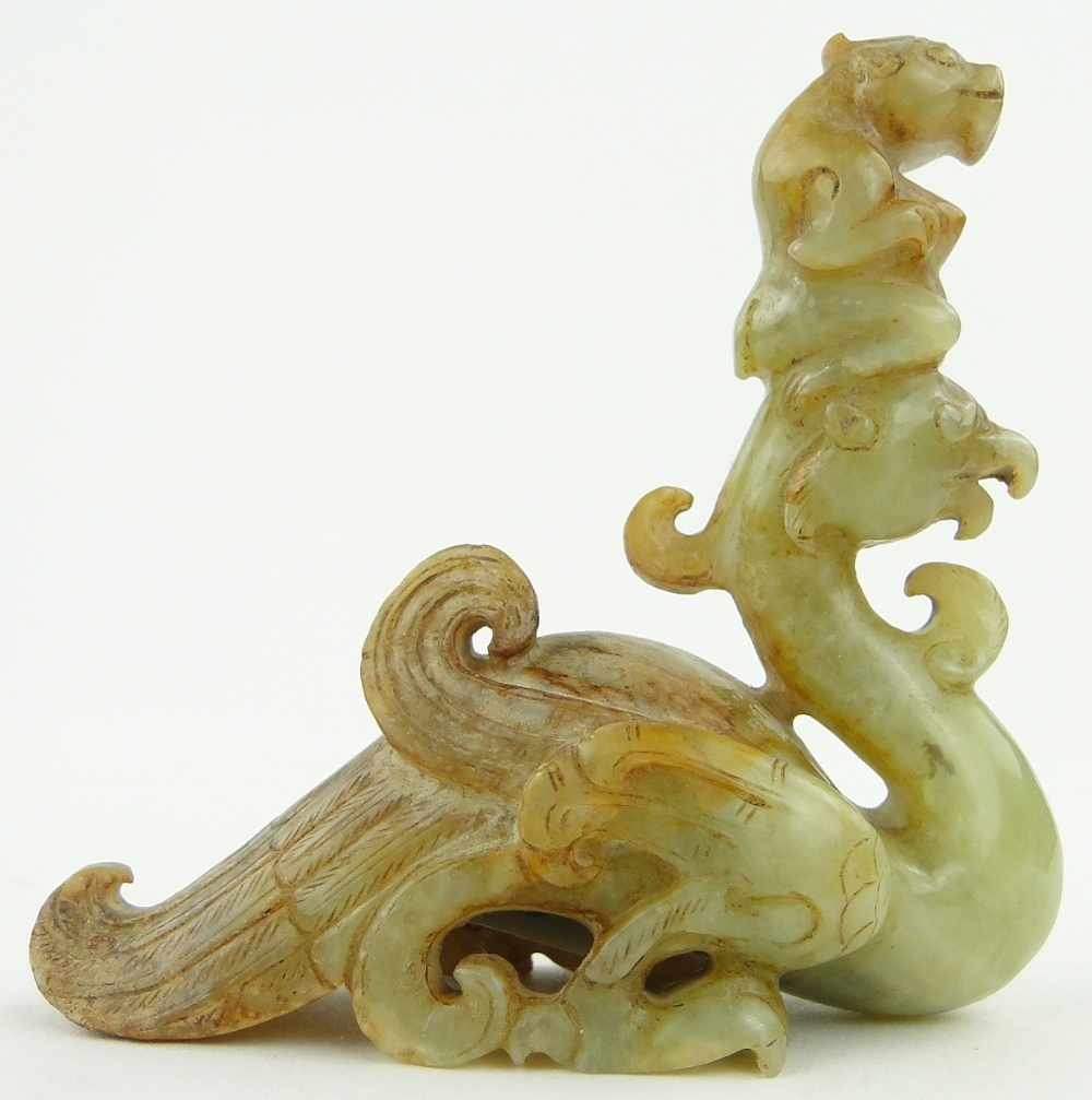 Chinese carved jade phoenix surmounted by a figure,
height 3.1". - Image 2 of 2