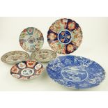 A pair of Imari dishes
with bird and floral design, 8.25", a blue and white charger, etc., (6).