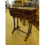 A 19th century mahogany sewing table, with rising lid,