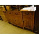 A reproduction yewwood break front sideboard with 4 drawers and cupboards under.