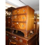 A mahogany bow front 3 drawer chest.