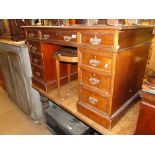 A Victorian mahogany twin pedestal writing desk.