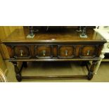 An Ipswich oak design dresser base, having 2 moulded drawers on baluster legs.