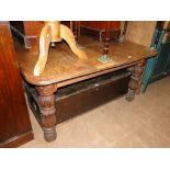 A large Victorian oak wind-out dining table,